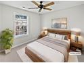 Cozy bedroom features a large window, a comfortable bed, and stylish bedside tables at 2555 Flat Shoals Rd # 3103, Atlanta, GA 30349