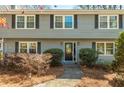 Traditional home featuring a brick walkway leading to the front door, surrounded by manicured bushes at 2733 Eagle Ridge Rd, Marietta, GA 30062