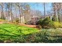 Expansive front yard with lush green lawn and mature landscaping, offering a serene outdoor space at 2733 Eagle Ridge Rd, Marietta, GA 30062