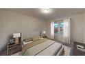 Cozy bedroom featuring neutral tones, a comfortable bed, and natural light, creating a serene retreat at 162 Sonoma Drive, Dallas, GA 30157