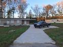 View of the long driveway leading to the front of the house with ample parking space at 3105 Hwy 78, Loganville, GA 30052