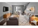 Cozy living room with neutral tones, plush seating, and stylish decor for a comfortable and inviting atmosphere at 4958 Meadow Ln, Marietta, GA 30068