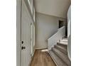 Inviting entryway featuring gleaming hardwood floors, staircase and high ceilings with plenty of natural light at 1083 Stoney Creek Ln, Austell, GA 30168