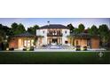 Stunning home exterior showcasing a private pool and a spacious outdoor patio area for entertaining at 4510 Muskogee Ct, Cumming, GA 30040