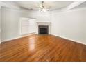 Bright room with hardwood floors and a cozy fireplace at 1832 Glenwood Ln, Snellville, GA 30078