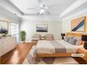 Comfortable bedroom with modern decor and a large window at 1832 Glenwood Ln, Snellville, GA 30078