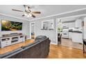 Cozy living room with hardwood floors and a view into the kitchen and dining areas at 3351 Phillip Cir, Decatur, GA 30032