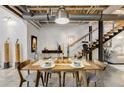 Cozy dining area featuring modern decor, a wooden table, seating for four, and stylish accents and art at 834 Dekalb Ne Ave # D, Atlanta, GA 30307