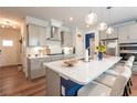 Beautiful kitchen with white countertops, stainless steel appliances, and center island with seating at 456 Millsap Way, Marietta, GA 30060