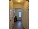 Inviting entryway with wood floors and neutral walls, leading to the main living areas of the home at 3191 Creston Park Ct, Duluth, GA 30096