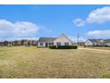 A single story residential home with a spacious front yard at 340 Nail Rd, Mcdonough, GA 30253