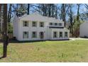 Attractive two-story home showcasing a well-maintained lawn and traditional architectural style at 513 S Malton Ct, Stone Mountain, GA 30083