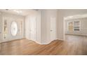 Bright foyer featuring hardwood floors and modern finishes at 109 Melrose Creek Dr, Stockbridge, GA 30281