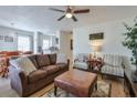Comfortable living room with ceiling fan, wood floors, and neutral tones at 160 Vine Nw St, Atlanta, GA 30314