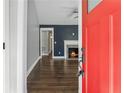 Inviting living room featuring hardwood floors, fireplace, and neutral color palette at 1683 Emerald Sw Ave, Atlanta, GA 30310