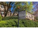 Stillwood Townhomes signage with manicured landscaping in a lovely residential neighborhood at 1346 Stillwood Chase Ne, Atlanta, GA 30306