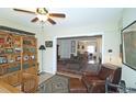 Home office boasting built-in shelves, a desk, and a comfortable seating area at 47 Monet Nw Ct, Atlanta, GA 30327