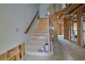 Wooden staircase under construction, showing exposed framing and unfinished walls at 1632 Caswell Pkwy # 8, Marietta, GA 30060