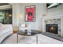 Inviting living area featuring a cozy fireplace and stylish decor accents at 928 Boudreau Ct, Atlanta, GA 30328