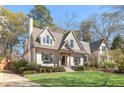 Beautiful two-story home with a well-manicured lawn and an inviting facade at 218 Garland Ave, Decatur, GA 30030