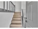 A welcoming entryway featuring wood stairs and a freshly painted door at 5075 S Woodbridge Trl, Stone Mountain, GA 30088