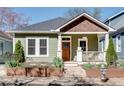 Charming single-story home featuring a cozy front porch and well-manicured landscaping at 280 Josephine St, Atlanta, GA 30307