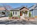 Charming single-story home featuring a cozy front porch and well-manicured landscaping at 280 Josephine St, Atlanta, GA 30307