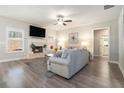 Cozy living room with a fireplace, neutral tones, and ample natural light at 2320 Ridge View Dr, Loganville, GA 30052