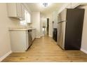 Modern kitchen featuring stainless steel appliances and updated cabinets at 2742 Bomar Rd, Douglasville, GA 30135