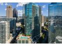 Stunning aerial view of the building, highlighting its location and amenities, including a rooftop pool at 1080 Peachtree Ne St # 1909, Atlanta, GA 30309