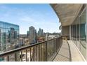 Spacious private balcony with city views, perfect for outdoor relaxation and entertaining at 1080 Peachtree Ne St # 1909, Atlanta, GA 30309