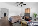 Cozy living room features neutral furniture, dark hardwood floors, and ample natural light at 1050 Boulevard Ne Dr, Atlanta, GA 30317