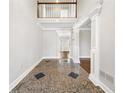 Elegant foyer with soaring ceilings, gleaming floors and decorative trim at 931 New Bedford, Marietta, GA 30068