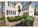 Stunning home boasting lush landscaping and a welcoming entrance at 2002 Stonewick Ct, Lawrenceville, GA 30043