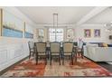 Elegant dining room featuring a large table, stylish chairs, and sophisticated decor at 4826 Ralin Ct, Atlanta, GA 30331
