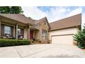 Spacious driveway leading to a well-maintained home with a two-car garage at 1976 Hedge Brooke Nw Trl, Acworth, GA 30101