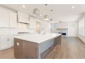 Spacious kitchen featuring an island, stainless steel appliances, and lots of cabinets at 162 Spaulding Ln, Woodstock, GA 30188