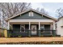 Attractive home with a inviting front porch that offers curb appeal and classic charm at 973 Parsons Sw St, Atlanta, GA 30314