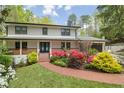 Charming two-story home with brick walkway and colorful landscaping at 2672 Langland Ne Ct, Atlanta, GA 30345