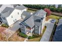 A beautiful home boasting a private driveway, welcoming porch, and meticulously maintained landscaping at 3660 Lake Pass Ln, Suwanee, GA 30024