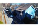 Two story home with double porch and blue siding with nearby street parking at 206 Reinhardt St Se, Atlanta, GA 30312