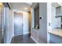 Modern hallway features granite countertop, updated appliances and access to the unit at 130 Arizona Ne Ave # 302, Atlanta, GA 30307
