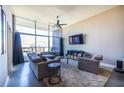 Inviting living room boasting a large window, comfortable seating, and modern decor providing a stylish atmosphere at 130 Arizona Ne Ave # 302, Atlanta, GA 30307