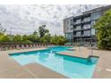 Enjoy the refreshing community pool and lounging area at this modern condominium at 130 Arizona Ne Ave # 302, Atlanta, GA 30307