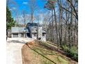 Charming home with a well-maintained exterior, featuring a two-car garage and picturesque surroundings at 2715 Brook Valley Dr, Cumming, GA 30041
