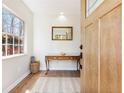 Inviting foyer with natural light, wood floors, and stylish décor at 2466 Thrasher Rd, Buford, GA 30519