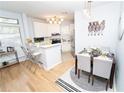 Bright open living space with a modern zebra art feature, adjacent to the kitchen at 821 Ralph Mcgill Ne Blvd # 3209, Atlanta, GA 30306