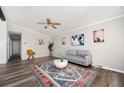 Bright and airy living room features stylish decor, hardwood floors, and a neutral color palette at 3162 Alston Dr, Decatur, GA 30032