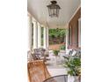 Cozy front porch with comfortable seating and stylish decor for relaxing and entertaining at 1308 Fairview Ne Rd, Atlanta, GA 30306