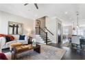 Bright living room featuring dark hardwood floors, neutral walls, and an open floor plan at 345 Glen Iris Ne Dr # 5, Atlanta, GA 30312